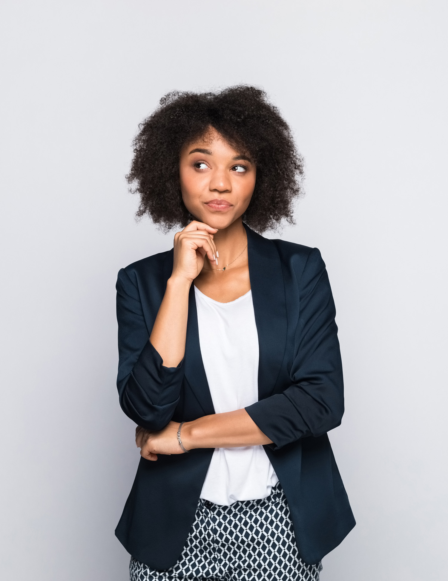 Portrait of thoughtful young businesswoman